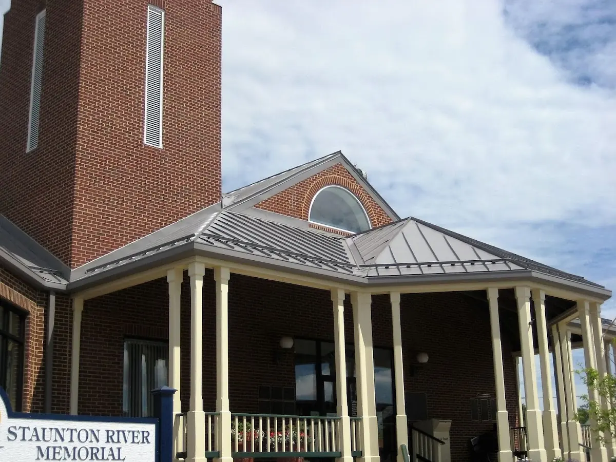 Skilled roofing craftsmen working on a residential roof in Spring Hill